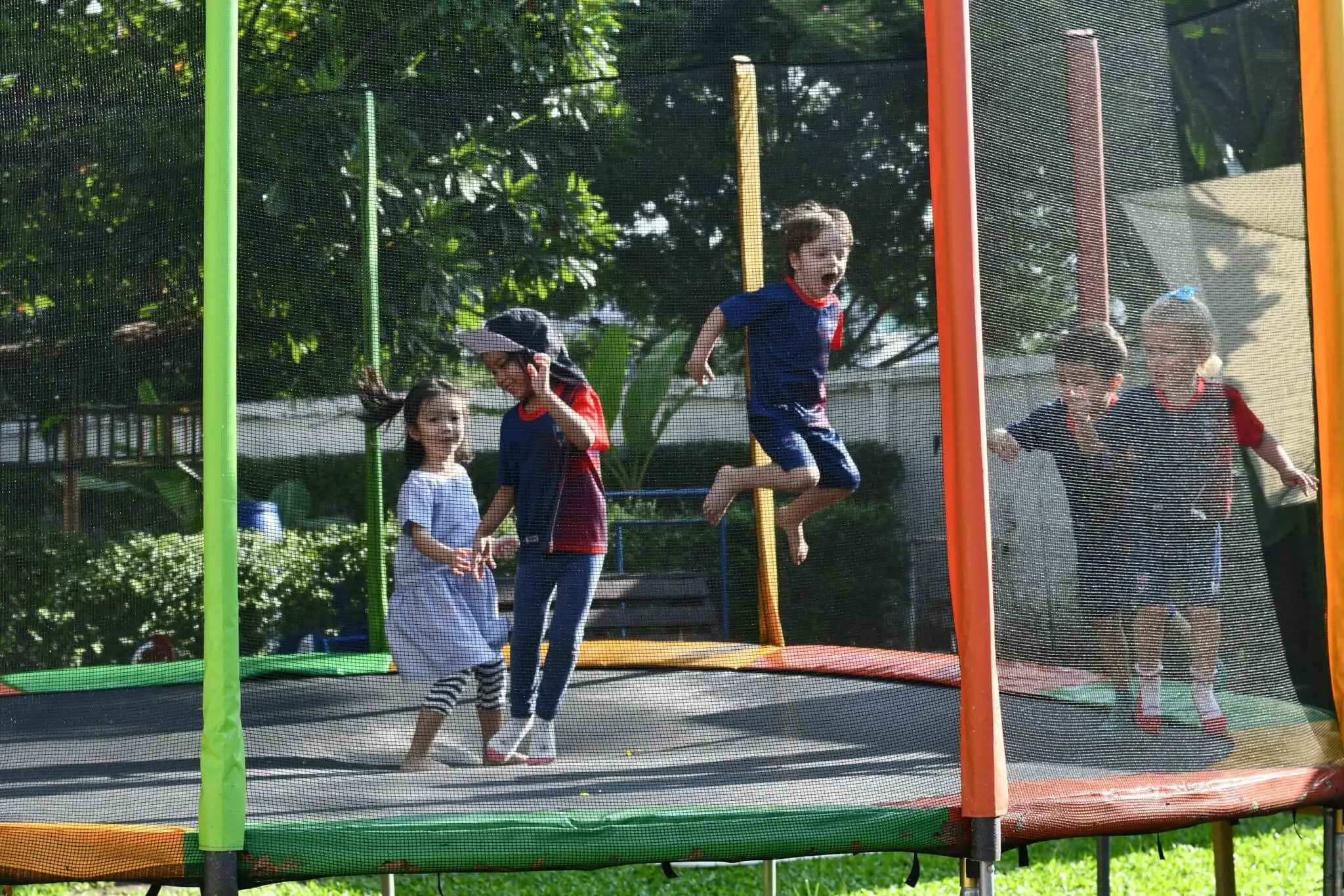 outdoor-learning-spaces-physical-development-trampoline-play